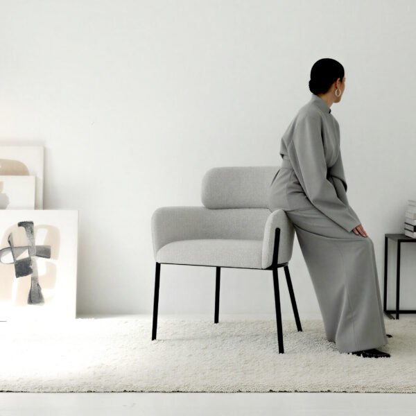White Bouclé Armchair with Curved Bolster Back & Black Metal Frame