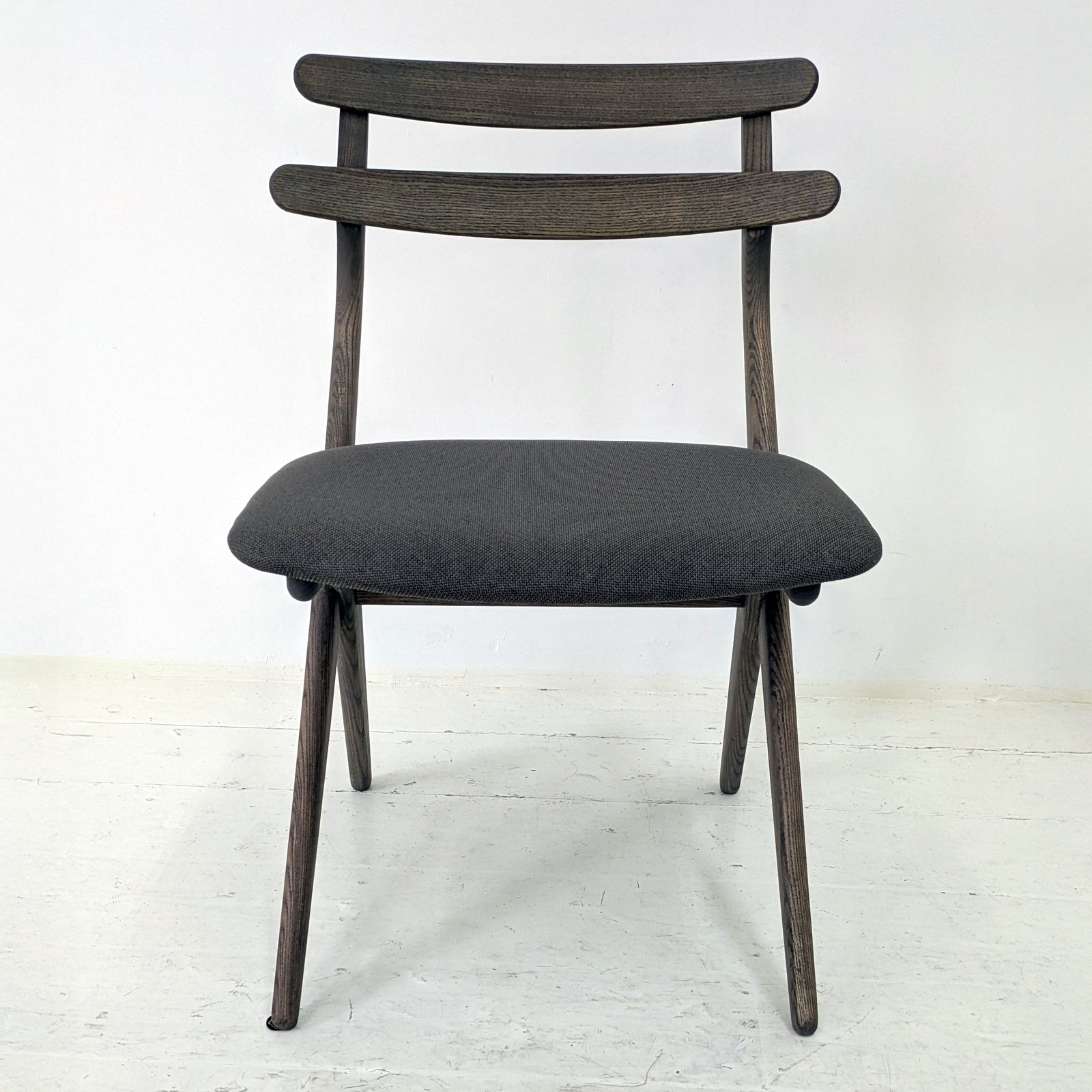 Grey Wood Dining Chairs with Scissor-Style Crossed Legs