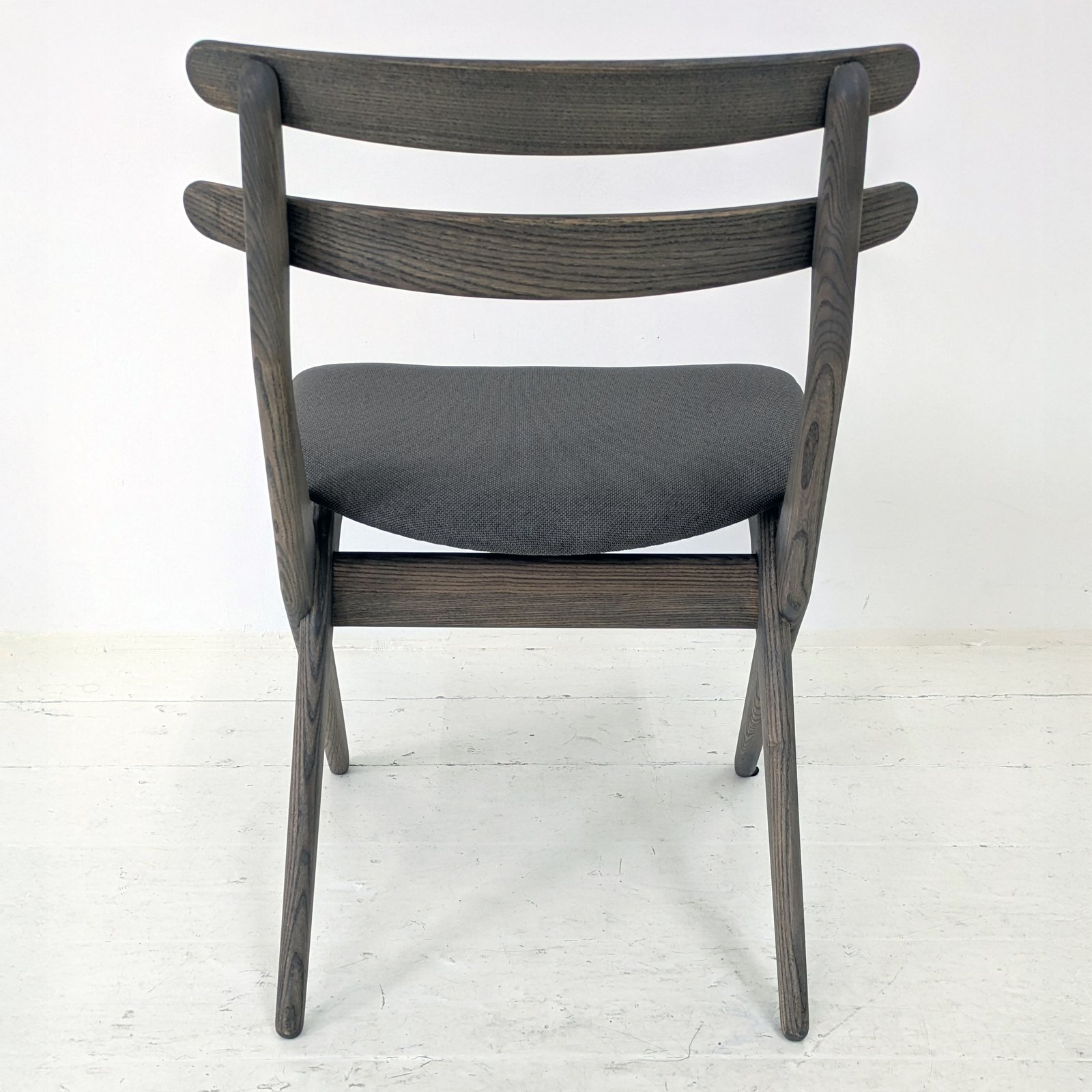 Grey Wood Dining Chairs with Scissor-Style Crossed Legs