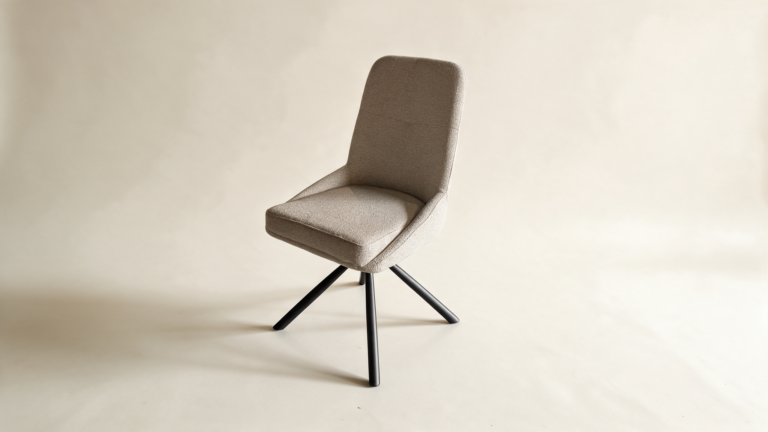 Tailored high-back swivel chair in grey fabric, side view
