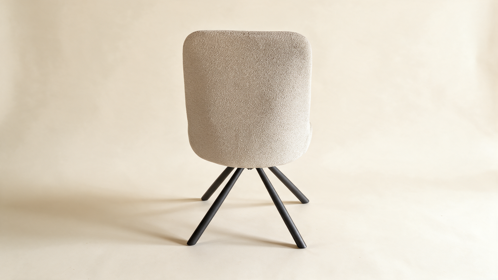 Tailored high-back swivel chair, rear view