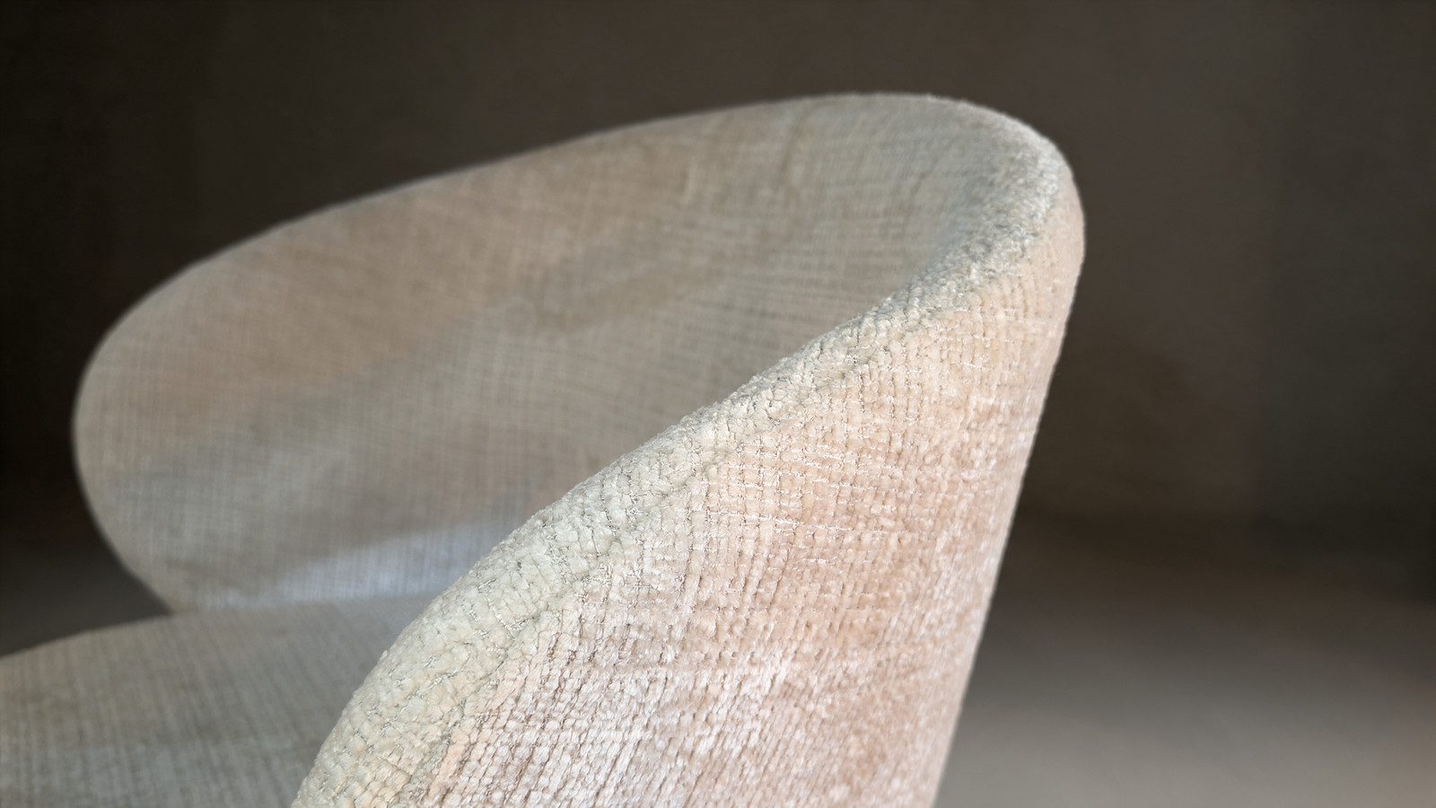 Boucle swivel accent chair with cut-out back, close-up of curved back