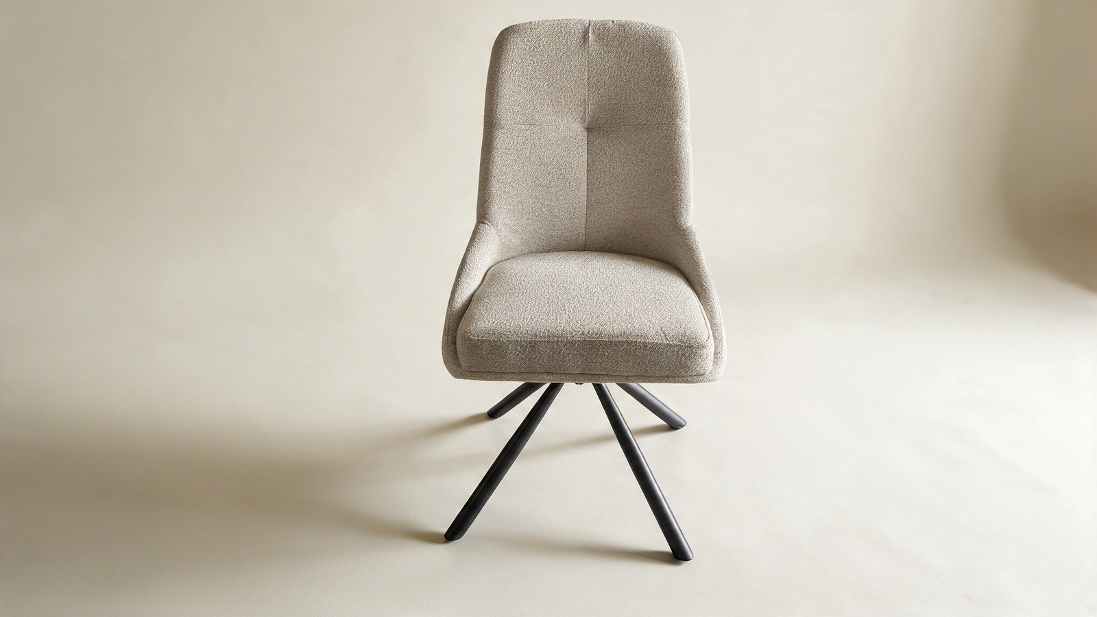 Tailored high-back swivel chair in grey fabric with black metal legs, front view