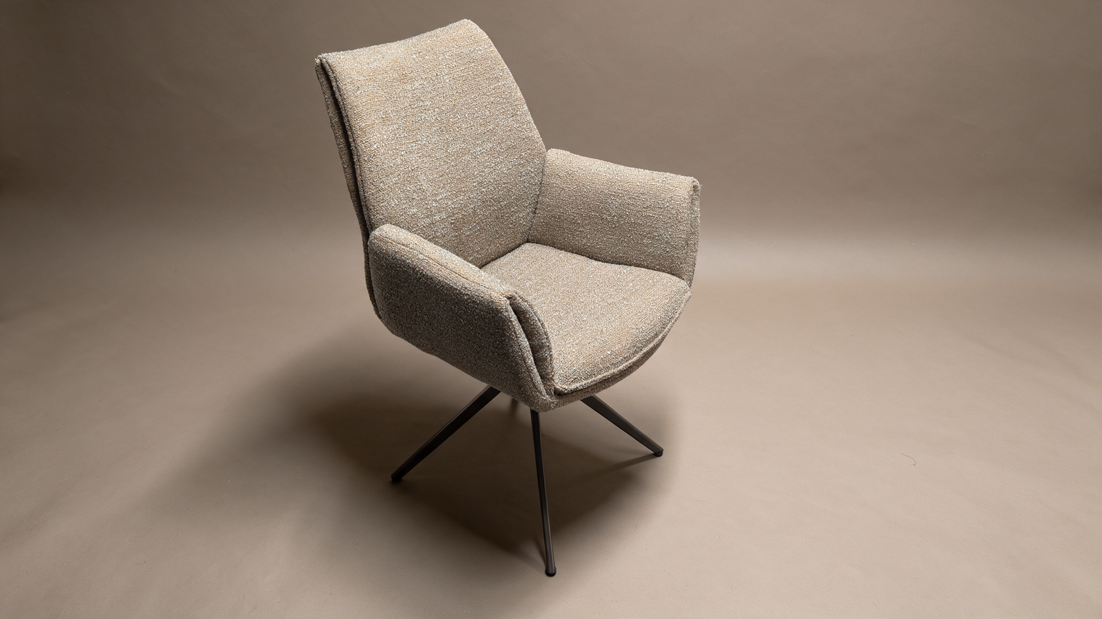 Boucle Swivel Armchair – Curved Wingback Design with Black Spider Legs