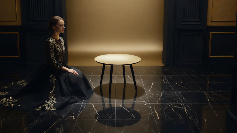 Round gold side table – view 1